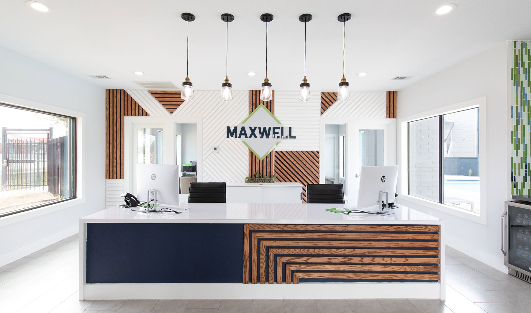 the reception area of a modern office building at The Maxwell